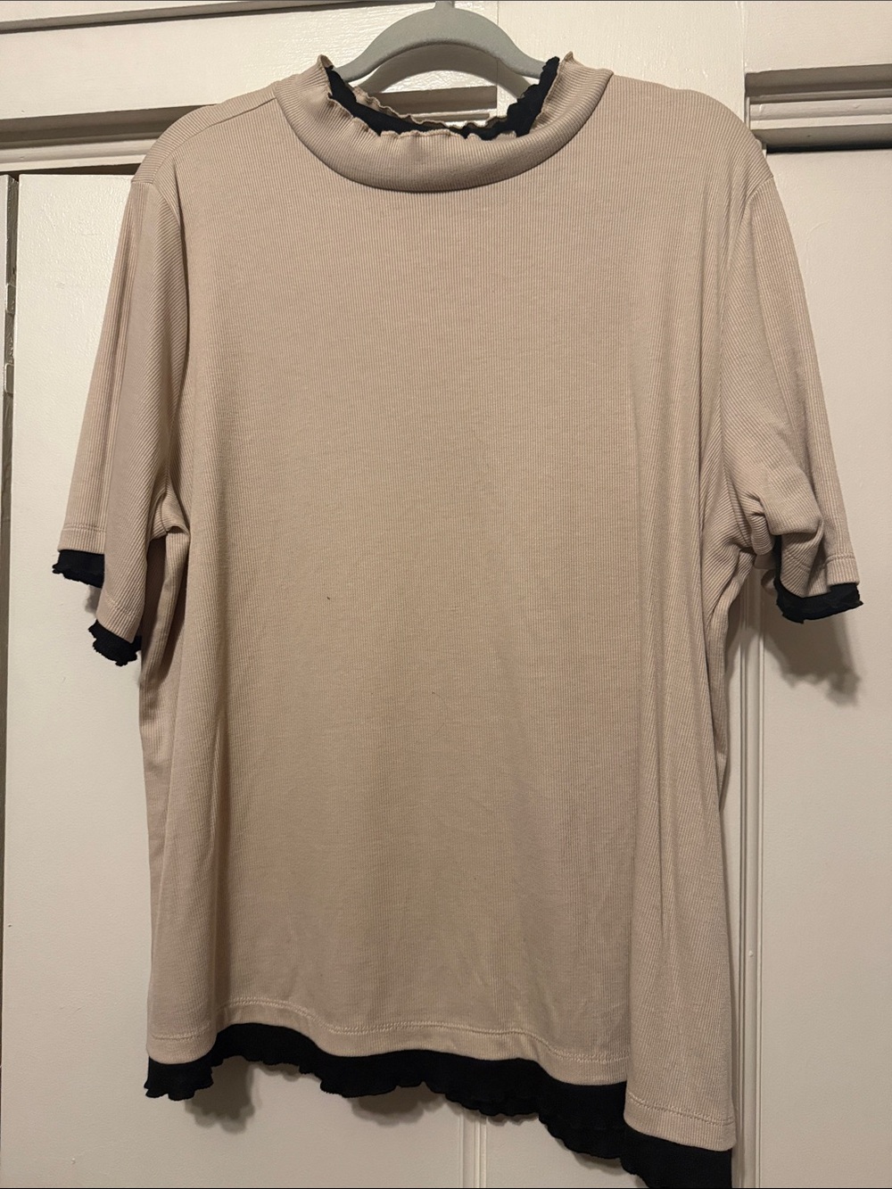 Tan and black short sleeve shirt